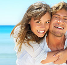 Happy couple relaxed after getting a security guarantor home loan